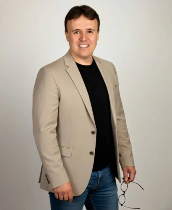 Carl Bufe — Director, Lead Auditor, and AI Integration Specialist at GxPVigilance — conducting a compliance review of clinical documentation, symbolising trust, precision, and responsible innovation.